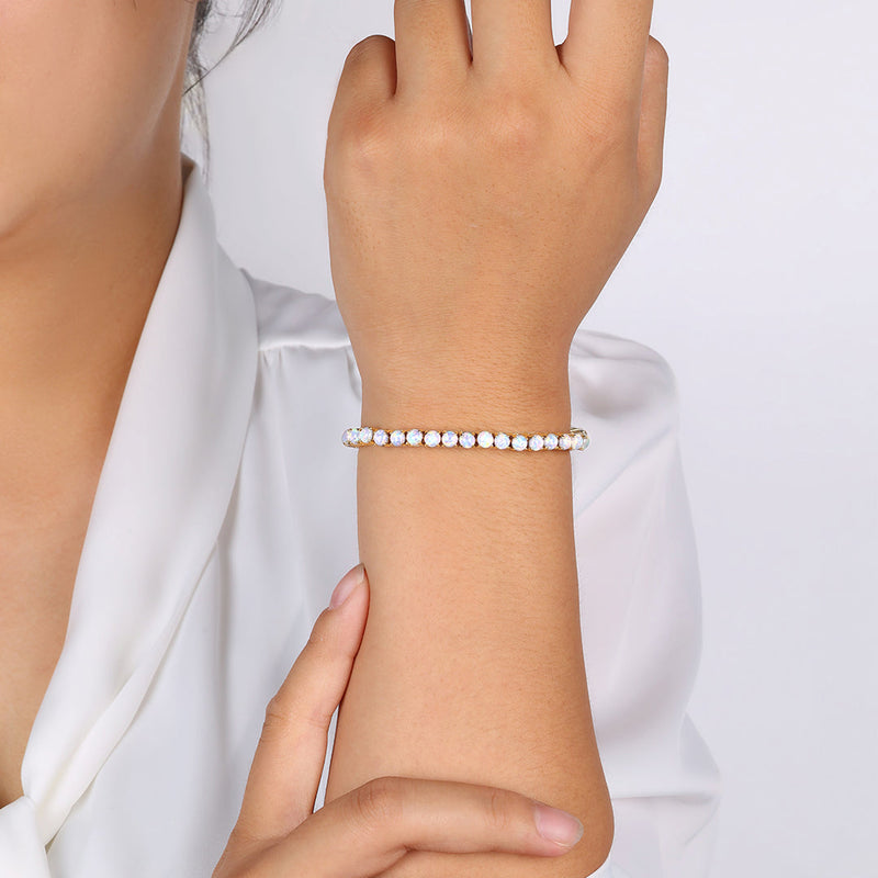 Azura blue opal tennis bracelet worn