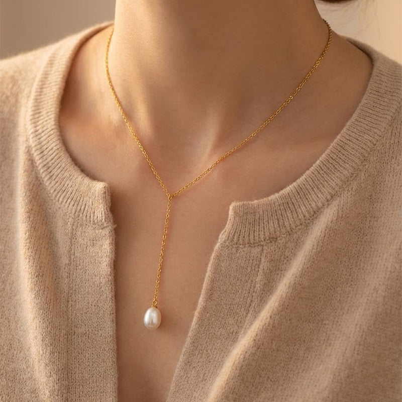 Elowen pearl lariat necklace worn at the neckline