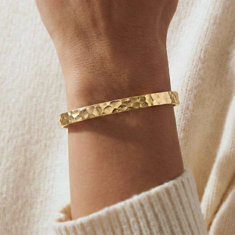 Thalia gold-tone hammered cuff in natural light
